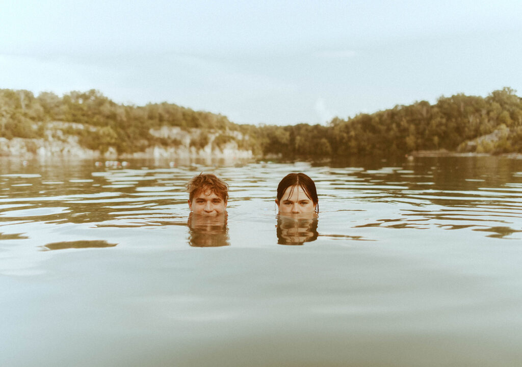 picture of a couple in a lake 